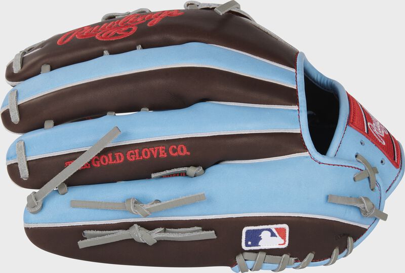 Sherry/Columbia blue back of a Heart of the Hide 12.75" outfield glove with a MLB logo on the pinky - SKU: PRO3039-6CH
