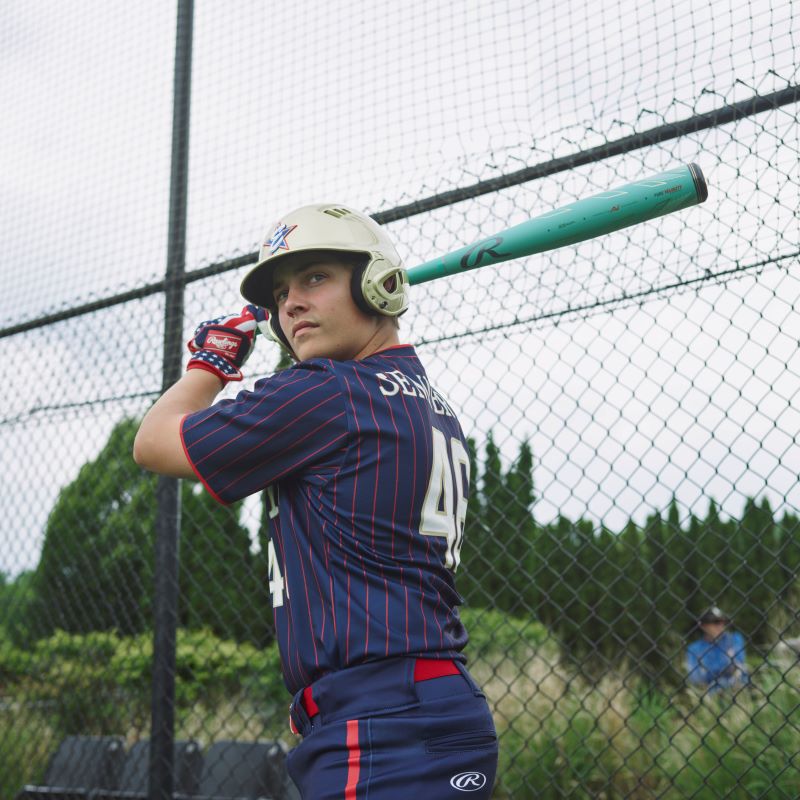 A player with an ocean mint Rawlings Mach AI baseball bat - SKU: RBB4MC3
