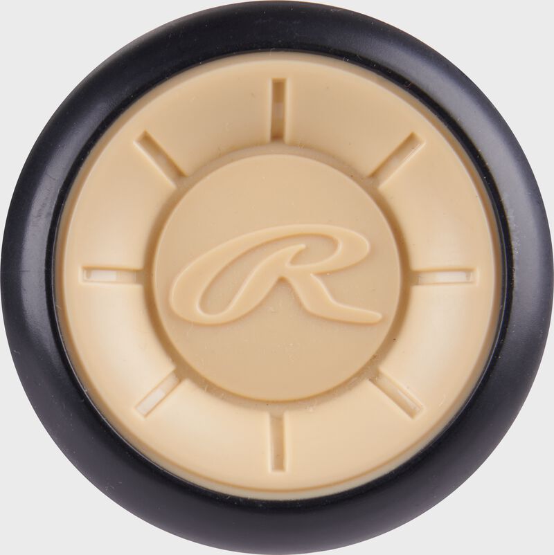 Tan end cap of a Rawlings Icon USA Baseball -8 bat with a "R" logo in the middle