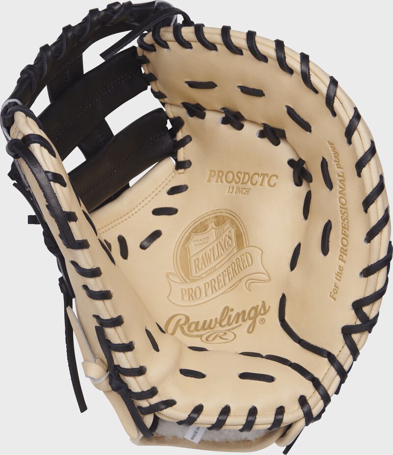 Palm view of a PROSDCTC Rawlings 13-inch first base mitt with a camel palm and black laces