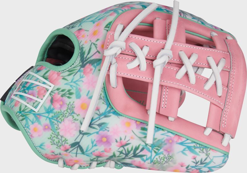Thumb of a floral Rawlings Mother's Day REV1X glove with a pink X-laced single post web