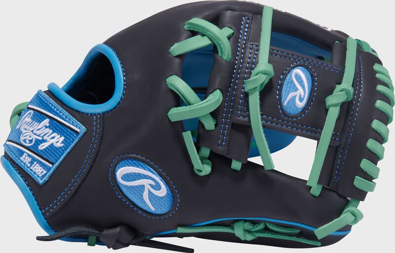 Thumb of an Exclusive Rawlings NXT Series 11.5" Infield Glove with a navy I-web