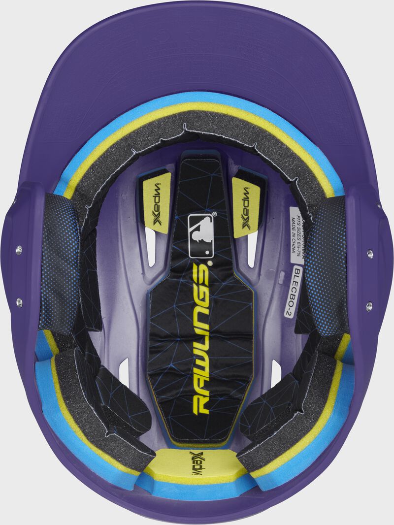 Inside of a Rawlings MACH baseball helmet with IMPAX durable foam padding loading=