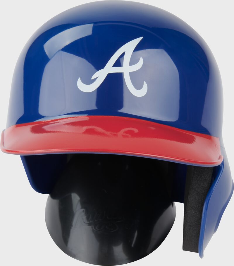 Front of a blue/red Atlanta Braves mini replica helmet