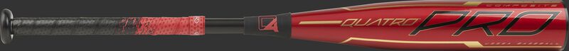 Barrel of a red UTZQ10 2020 Quatro Pro USSSA bat with black/gold accents