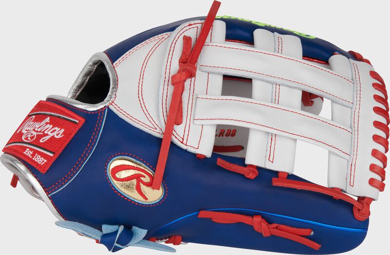 Thumb of a royal/white Gameday 57 Series Luis Robert Heart of the Hide glove with a white H-web
