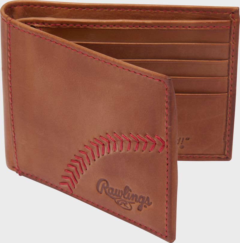 A tan Rawlings Double Play bi-fold wallet standing opened up
