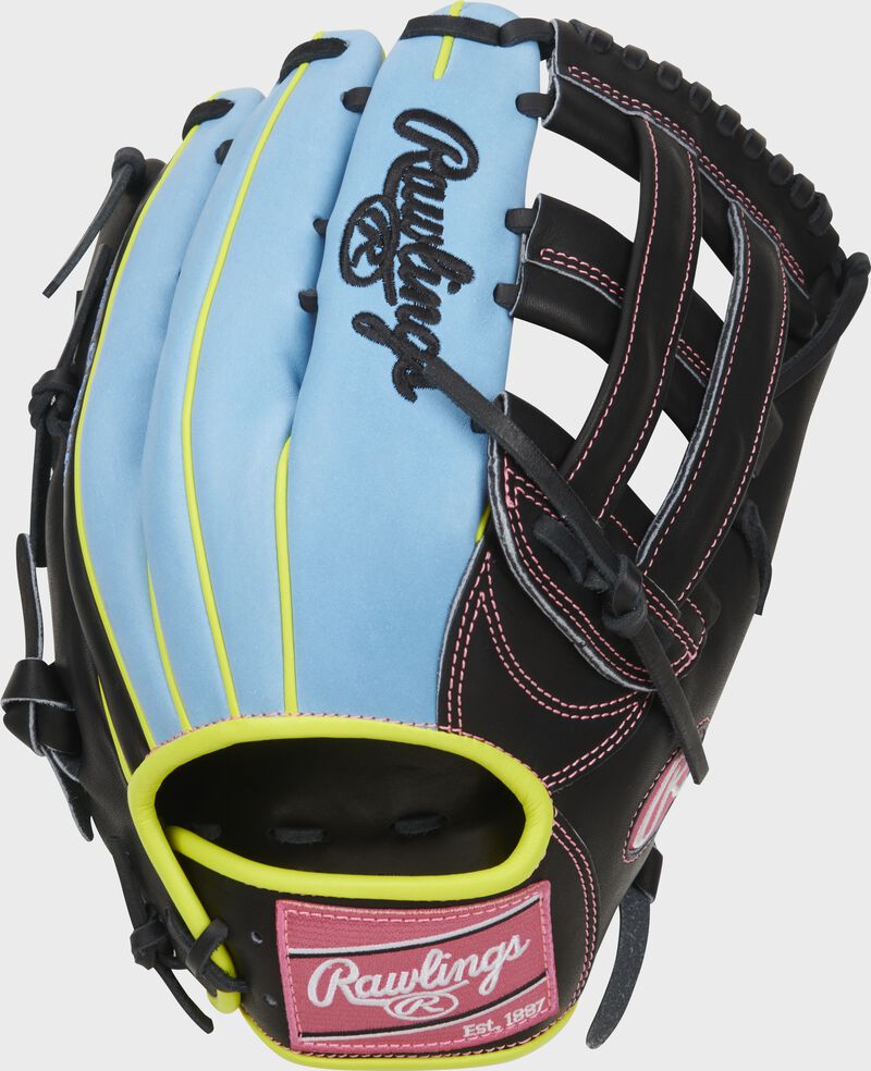 Back of a Columbia blue/black Heart of the Hide 12.75" ColorSync H-web outfield glove with a pink Rawlings patch - SKU: PRO3039-6BCB