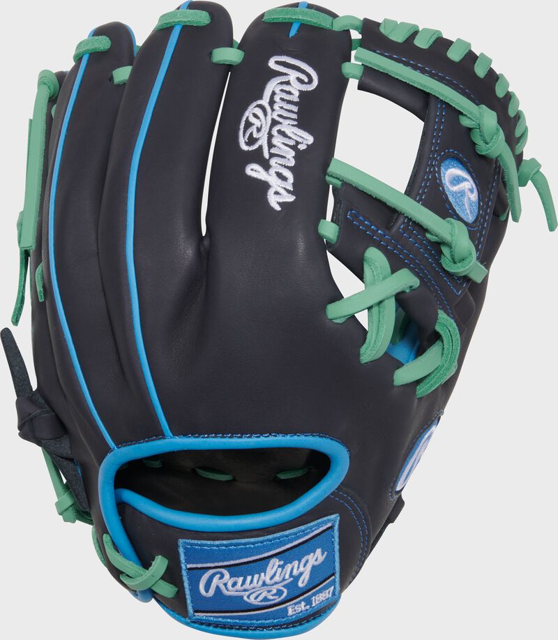 Navy back of a Rawlings Exclusive Rawlings NXT Series 11.5" Infield Glove with a Columbia blue Rawlings patch