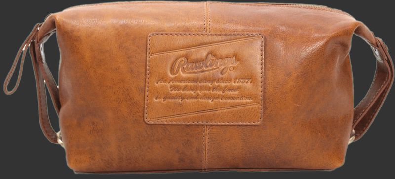 A tan Rugged travel kit with a leather patch sewn on with the Rawlings logo and script text underneath - SKU: V625-202