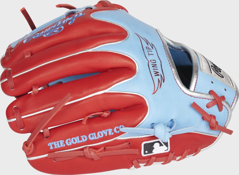 Back of a scarlet/Columbia blue Heart of the Hide R2G Wing Tip glove with the MLB logo on the pinky - SKU: RSGPROR204W-2CBS