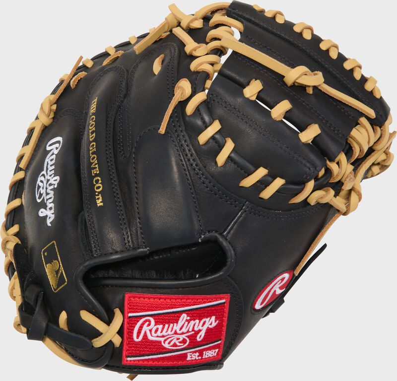 Black back of a Rawlings R9 ContoUR 32-Inch Catcher's Mitt with a red Rawlings patch loading=