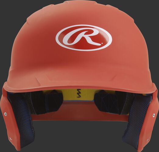 Front of a matte burnt orange MACH junior size batting helmet