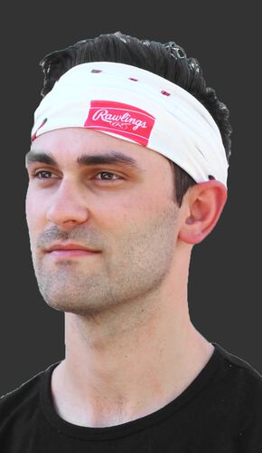 A guy wearing a white baseball stitch multi-functional neck gaiter as a head band - SKU: RC40001-100