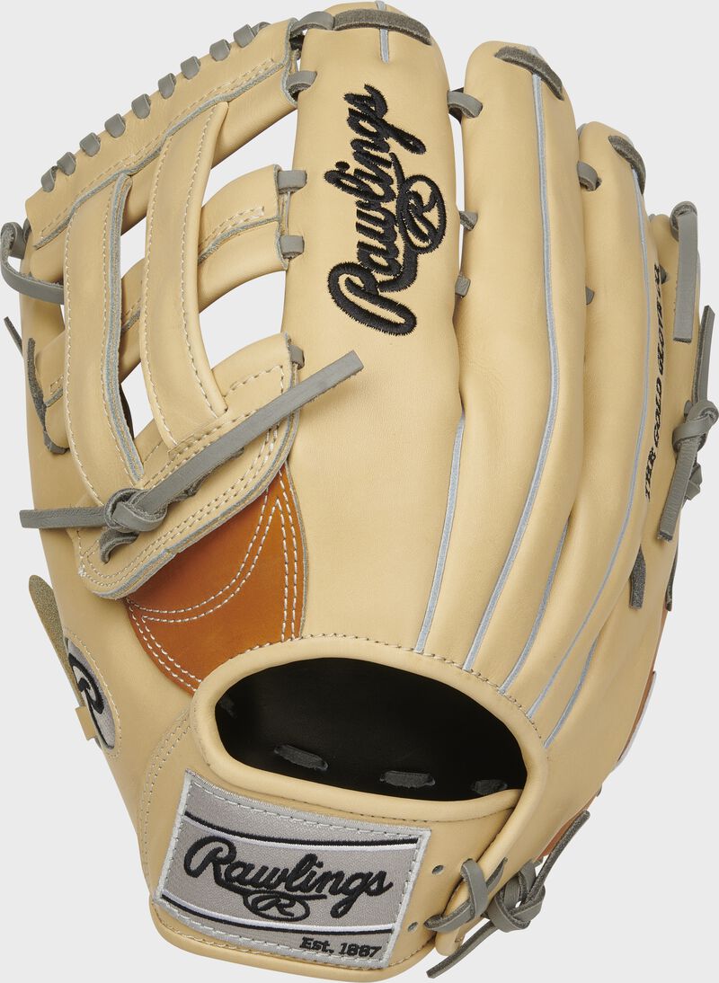 A left hand throw Heart of the Hide H-web outfield glove with a camel back and silver Rawlings patch - SKU: PRO3039-6TC-RH
