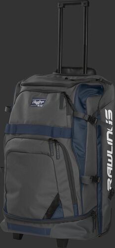 Left angle view of a grey/navy R1801 catcher's backpack with the pull handle extended