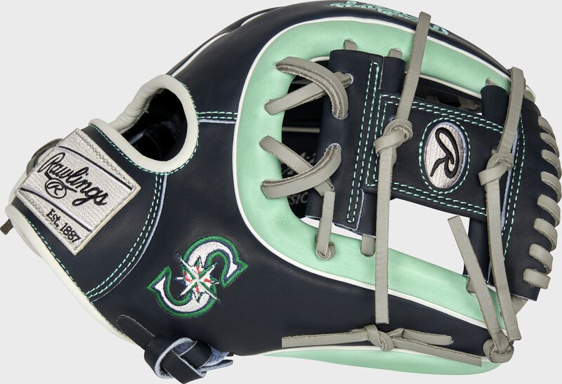 Thumb of a 2021 Seattle Mariners Heart of the Hide glove with the Mariners logo on the thumb - SKU: RSGPRO314-2SEA loading=