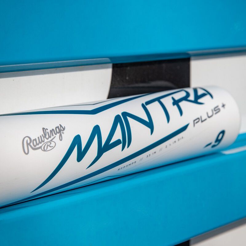 Barrel of a white Mantra+ fastpitch bat on a blue bench - SKU: RFP3MP