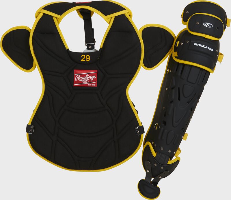 A black/yellow pro model chest protector and matte black leg guard with yellow accents