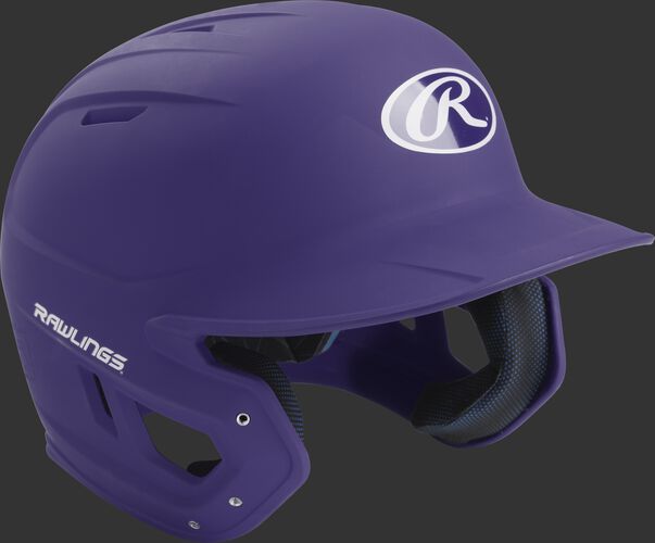 Right angle view of a matte MACH batting helmet with a purple shell