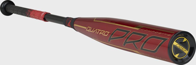 3/4 angle view of a BBZQ3 Rawlings High School/College -3 Quatro Pro with a red barrel and black/gold end cap