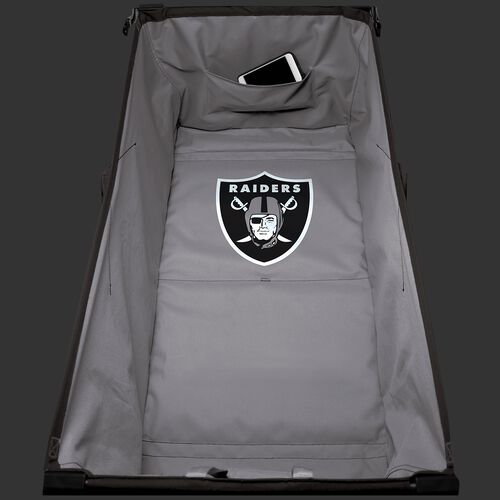 Inside of an Oakland Raiders tailgate wagon with a team logo in the middle SKU #00931072519