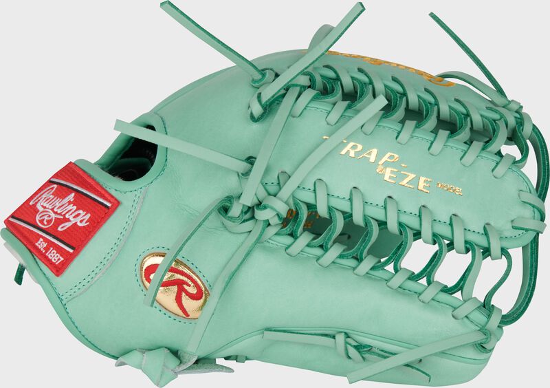 Thumb of an ocean mint Gameday 57 Series Harrison Bader Pro Preferred glove with a Trap-Eze web loading=