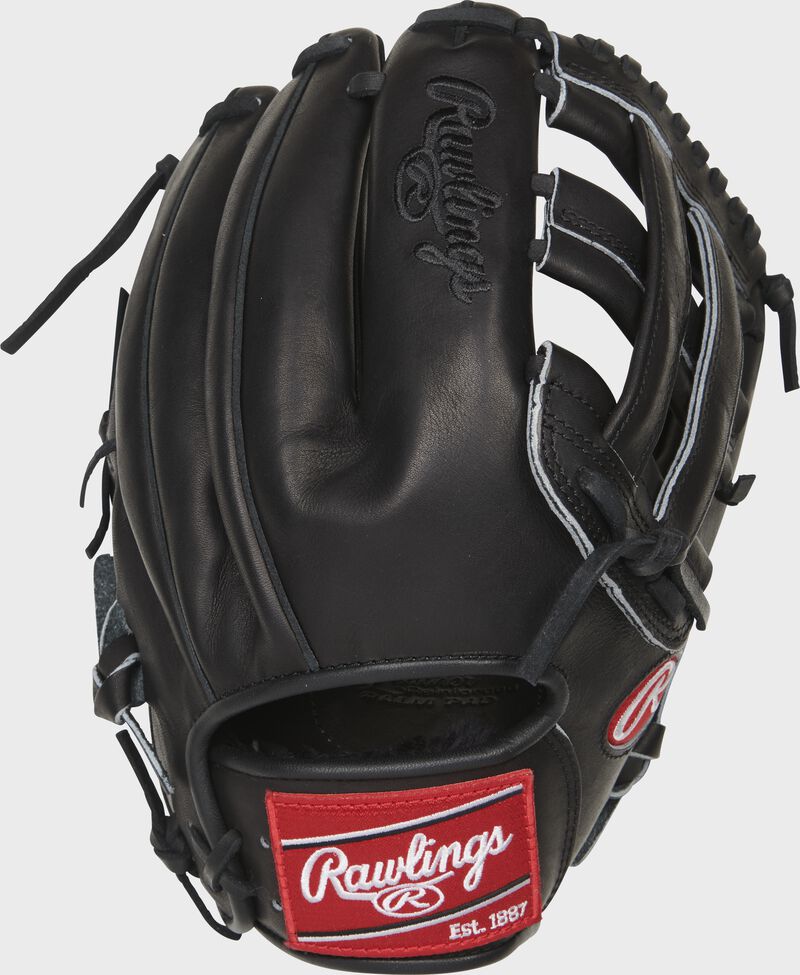 Back of a black Heart of the Hide 12-Inch H-web glove with a red Rawlings patch - SKU: RSGPRO10006JBPRO loading=