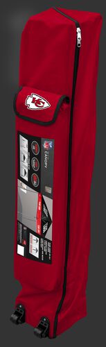 Red wheeled carry case of a Kansas City Chiefs canopy with the team logo on the outside compartment - SKU: 02231071111