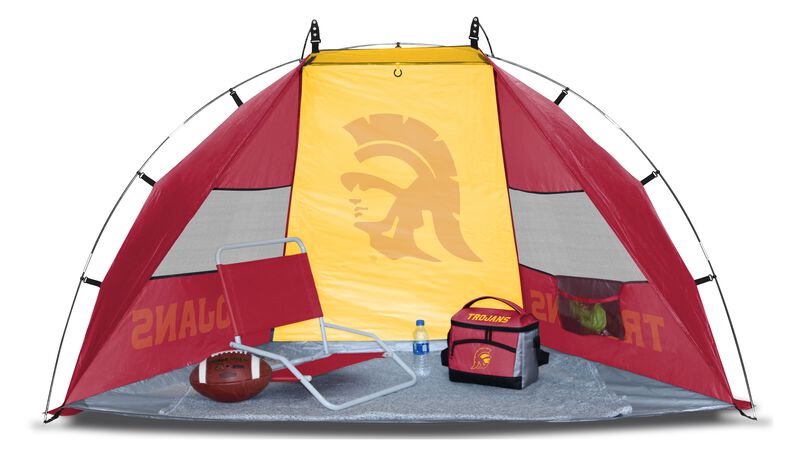 A USC Trojans sideline sun shelter set up with a chair, cooler, football and water bottle - SKU: 00973100111