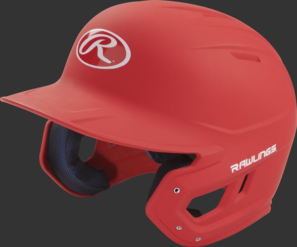 Left angle view of a Rawlings MACH Senior helmet with a one-tone matte scarlet shell