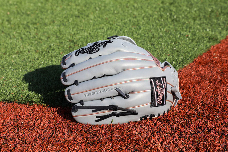 A gray Rawlings Liberty Advanced Color Series outfield glove on a field - SKU: RLA1275SB-6GRG