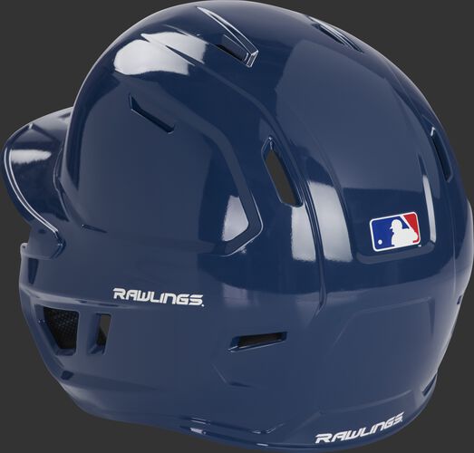 Left back of a navy MCH01A Rawlings Mach batting helmet with optimized air ventilation holes