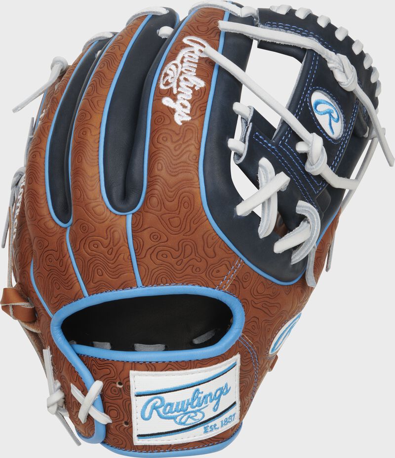 Golden brown geo-print back of a Heart of the Hide ColorSync 8.0 11.75" I-web glove with a white/Columbia blue Rawlings patch - SKU: PRO314-2GBN