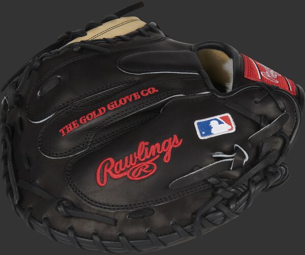 A black Pro Preferred catcher's mitt with the MLB logo on the pinky - SKU: PROSCM43JR10