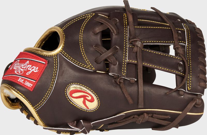 Thumb of a mocha Gameday 57 Series Manny Machado Pro Preferred glove with a V-web and gold Oval-R - SKU: PROSNP7-MM13