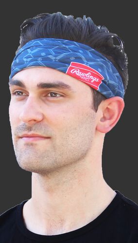 A guy wearing a navy Rawlings multi-purpose neck gaiter as a head band - SKU: RC40005-400