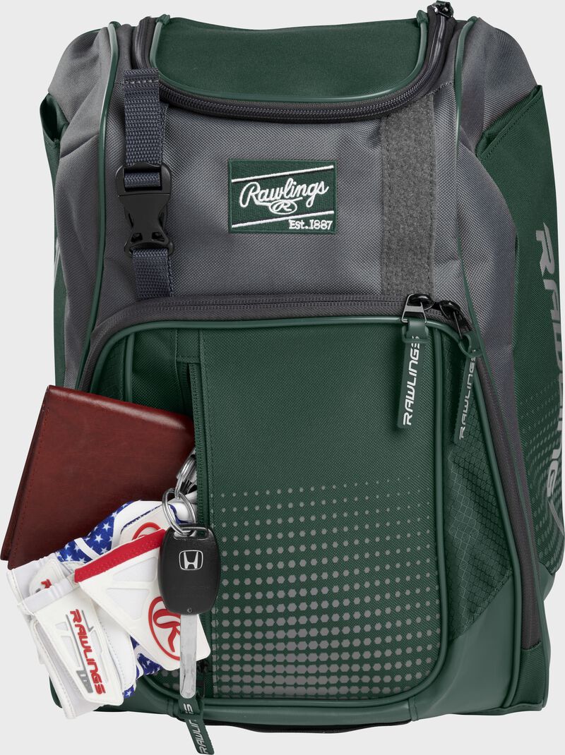 Wallet, keys, and batting gloves in the front valuables pocket of a dark green Franchise baseball bag - SKU: FRANBP-DG