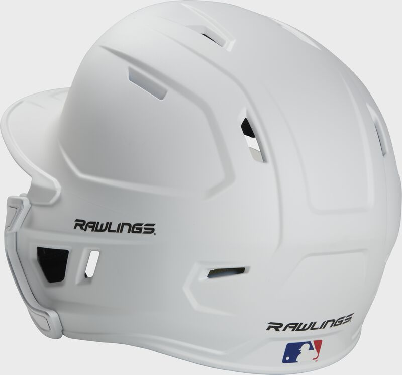 Back left view of a matte white MACHEXTR MACH series batting helmet with air vents