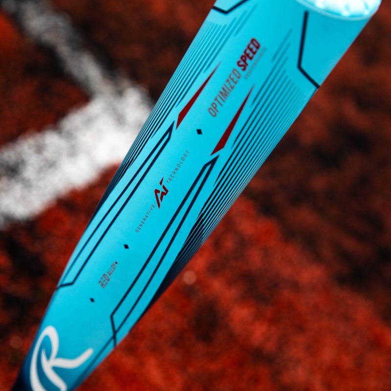 Barrel of a light blue Clout AI BBCOR bat with a field in the background