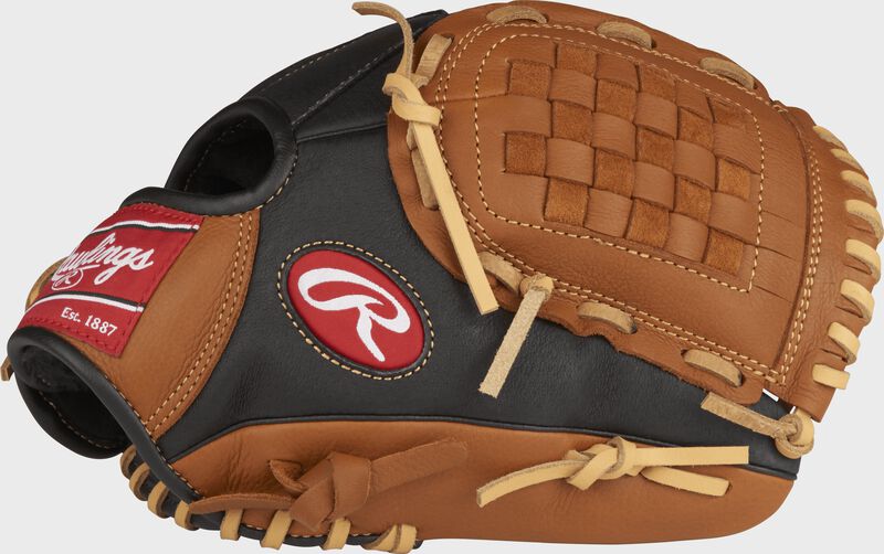 Thumb view of a black P110GBB Prodigy 11-inch youth infield glove with golden brown trim and Basket web