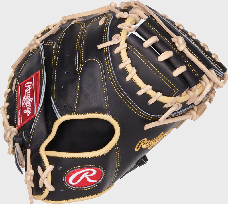 Black back of an Adley Rutschman Heart of the Hide 34" catcher's mitt with a 1-piece solid web