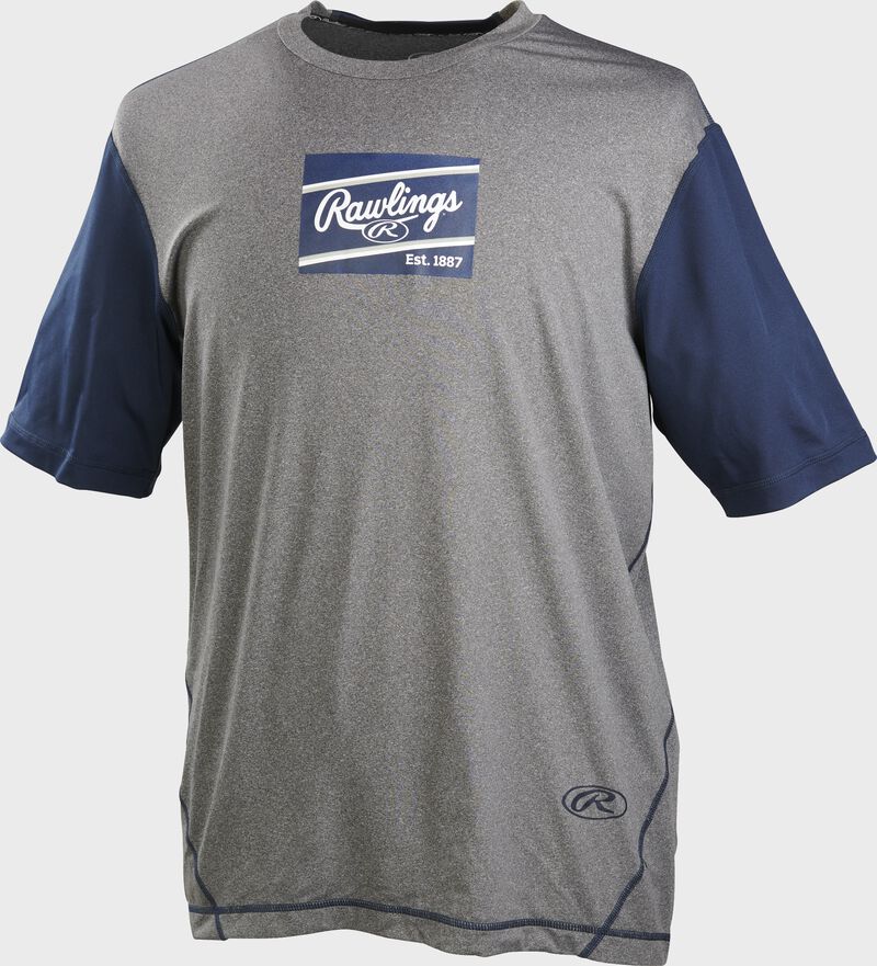A gray/navy Rawlings adult Hurler performance short sleeve shirt with a navy Rawlings logo on the chest - SKU: HSSP-GR/N