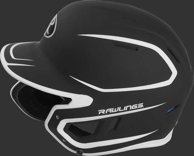 Left side of a MACHEXTR junior Rawlings batting helmet with a two-tone matte black/white shell