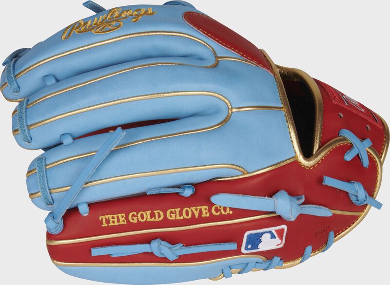 Back of a columbia blue/scarlet Kolten Wong Heart of the Hide glove with the MLB logo on the pinky - SKU: RSGPRO314-7SCB