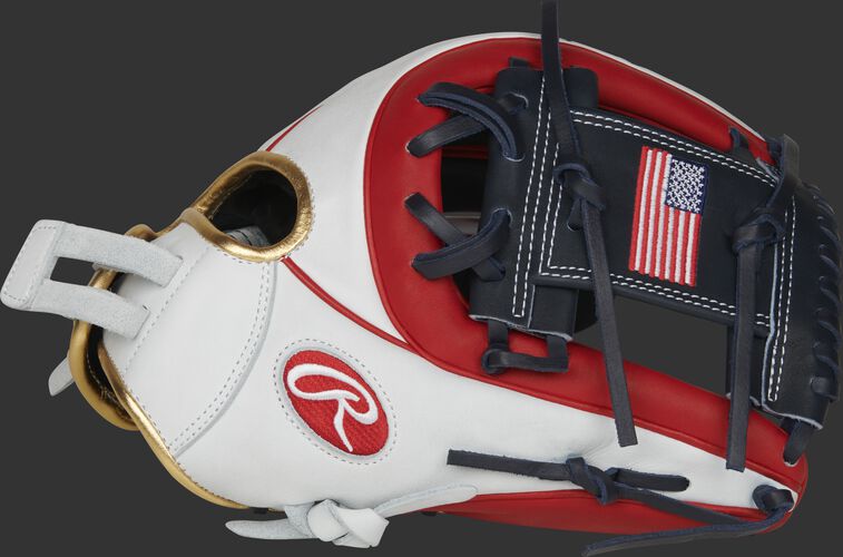 Thumb of a white/scarlet PRO716SB-2USA Heart of the Hide 12-Inch USA softball glove with a USA flag on the navy I-web