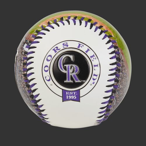 Colorado Rockies team logo on a MLB stadium baseball