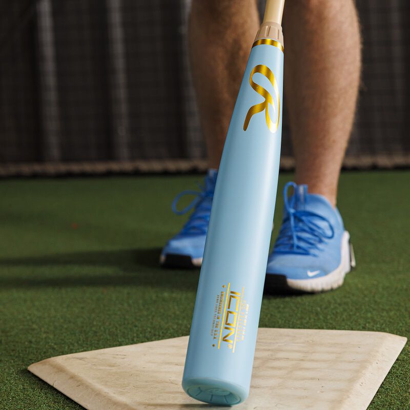 Columbia blue barrel of a Rawlings Icon Pro Preferred BBCOR baseball bat tapping home plate
