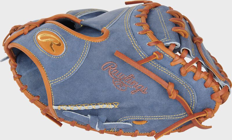 Thumb of a Heart of the Hide Pro Label Denim catcher's mitt with a 1-piece solid web