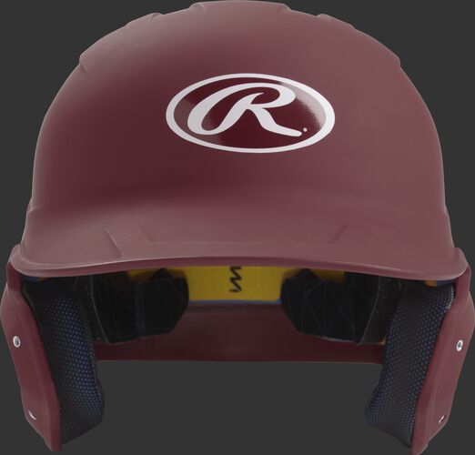 Front of a matte maroon MACH junior size batting helmet